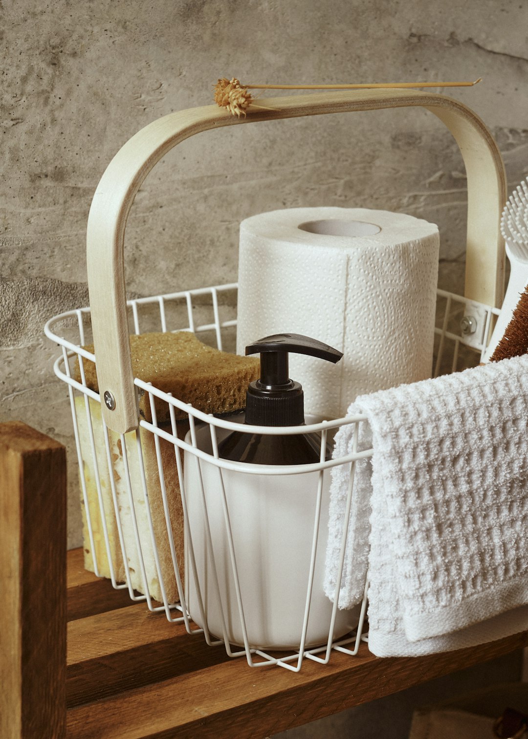 services-03 a-white-basket-filled-with-lots-of-bathroom-items-fji5haulxfq